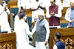 PM Narendra Modi, Rahul Gandhi shake hands as they welcome new Lok Sabha Speaker Om Birla